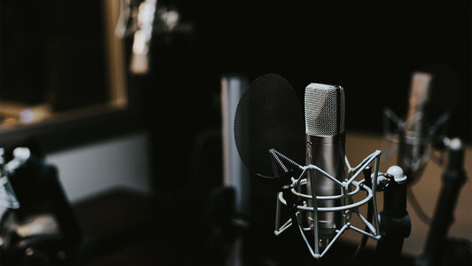 Picture of a condenser microphone in a recording studio from a blog about top microphones to choose for recordings