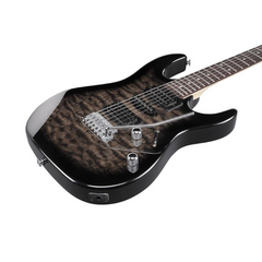 Ibanez GRX70QA body close-up, black sunburst quilt with chrome tremolo and pickups