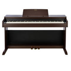 Casio AP-270 Celviano digital piano in brown, front view with three pedals