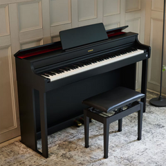 Casio Celviano AP-300 digital piano in black, in a room with matching bench