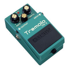 Boss TR-2 Tremolo guitar pedal in green, angled top view of controls