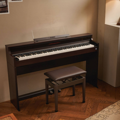 Casio Celviano AP-S450 digital piano in brown, in a room with matching bench