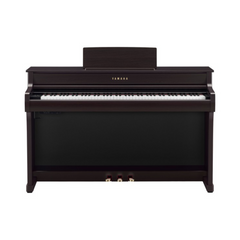 Yamaha CLP-835 Clavinova digital piano in rosewood, front view with pedals