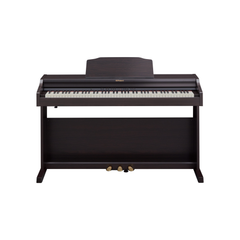 Roland RP501R digital piano in contemporary rosewood, front view with music rest and pedals