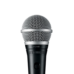 Shure PGA48 dynamic vocal microphone, close-up of grille and on/off switch