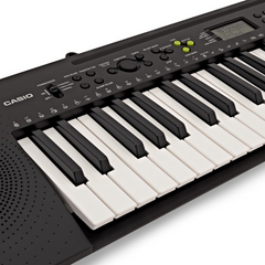 Casio CTK-240 control panel close-up angled, LCD display and rhythm tone buttons