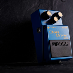 Boss BD-2 Blues Driver overdrive pedal in blue, angled view of knobs