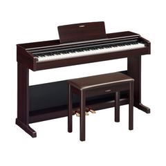 Yamaha Arius YDP-105 digital piano in rosewood, angled view with matching bench