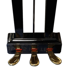 Yamaha G1E three brass pedals close-up on polished black lyre