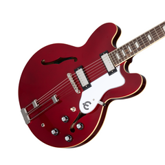 Epiphone Riviera guitar body close-up, burgundy with f-hole, white pickguard and humbuckers