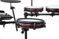 Alesis Nitro Max mesh tom pads close-up with red rims and Nitro Max drum module