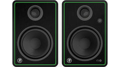 Mackie CR5-X studio monitor speaker pair, straight-on front view with green trim