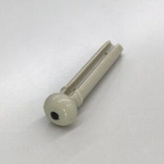Ibanez acoustic bridge pin, single ivory pin with red dot on white background